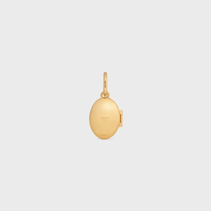 Bedels Olifantmedaillon van messing met gouden afwerking, email en staal
