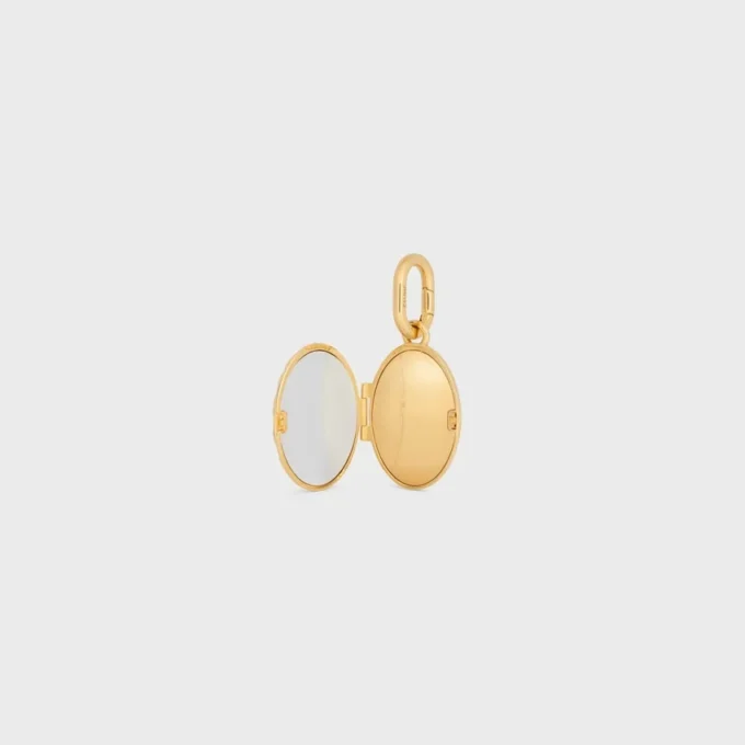 Bedels Olifantmedaillon van messing met gouden afwerking, email en staal