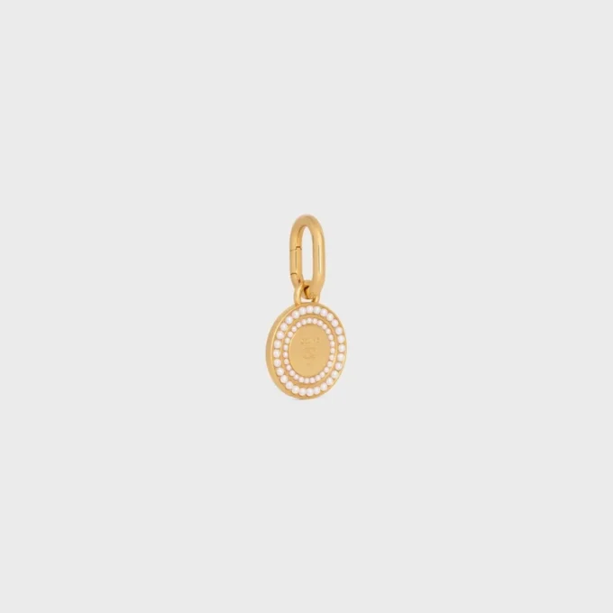 Bedels Parelmedaille van harsparels en messing met gouden afwerking
