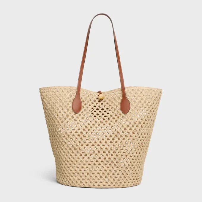 Bucket Triomphe Beads-mand van raffia en kalfsleer