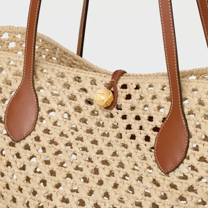 Bucket Triomphe Beads-mand van raffia en kalfsleer