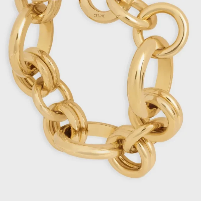 CELINE Charms Heritage dikke armband van messing met gouden afwerking