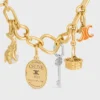 CELINE Charms Triomphe in email en messing met gouden afwerking