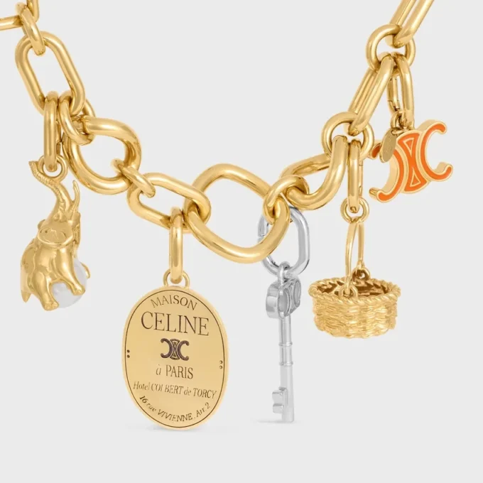 CELINE Charms Triomphe in email en messing met gouden afwerking