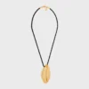 CELINE Dafila schelpenketting van messing met gouden afwerking en zijde