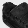 CELINE Huntington lage vetersneaker van getrommeld leer en mesh
