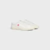 CELINE Lou lage vetersneaker met Triomphe-logo in canvas en kalfsleer
