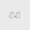 CELINE Lou lage vetersneaker met Triomphe-logo in canvas en kalfsleer