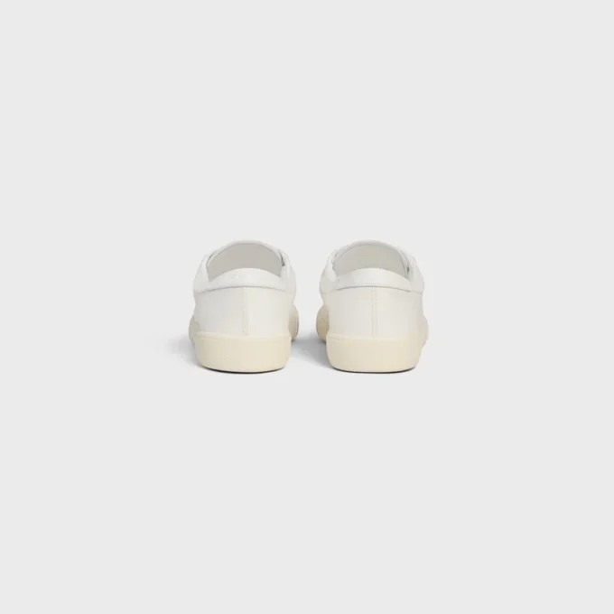 CELINE Lou lage vetersneaker met Triomphe-logo in canvas en kalfsleer