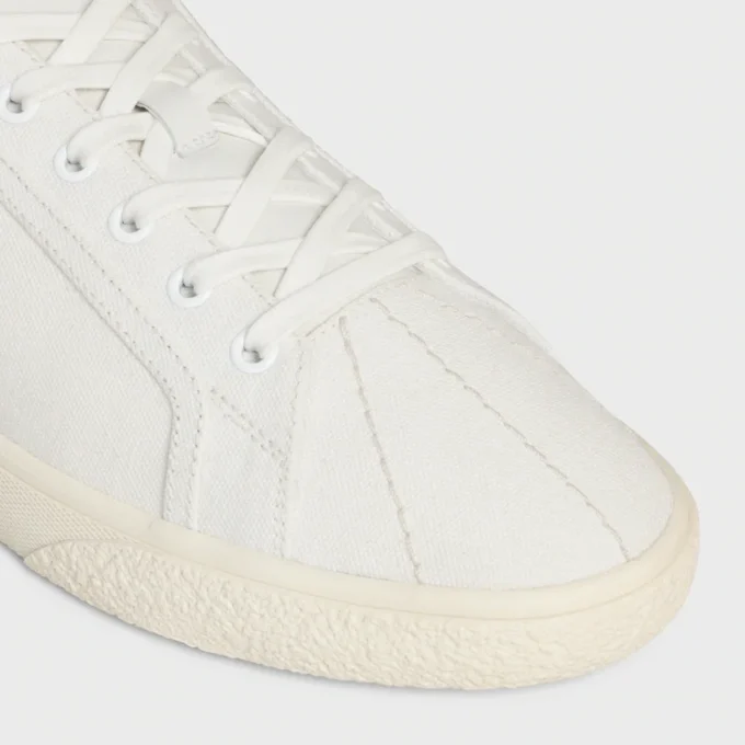 CELINE Lou lage vetersneaker met Triomphe-logo in canvas en kalfsleer