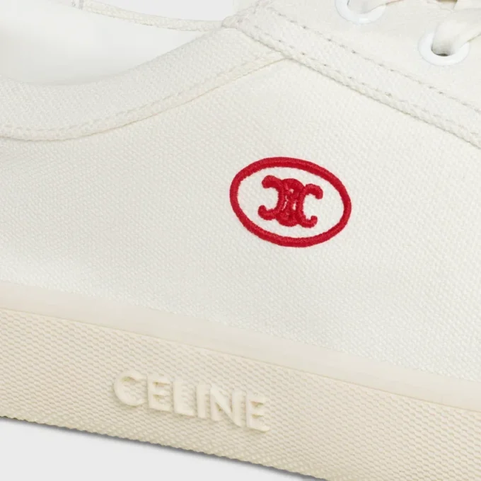 CELINE Lou lage vetersneaker met Triomphe-logo in canvas en kalfsleer