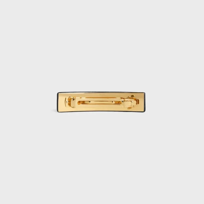 CELINE Paris haarclip van lamsleer, messing met gouden afwerking en staal