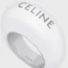 CELINE Sulky-ring van email en messing met rhodiumafwerking