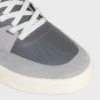 CELINE Trainer Ct-09 lage vetersneaker van suède kalfsleer, kalfsleer en mesh