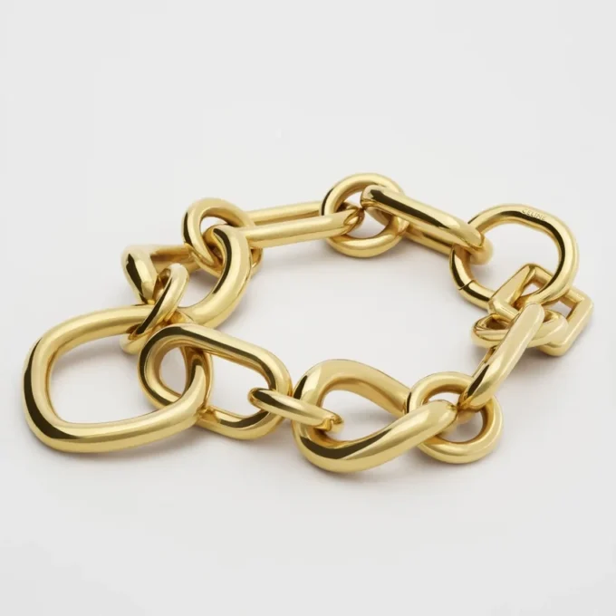 Charms Moderne dunne gourmette van messing met gouden afwerking