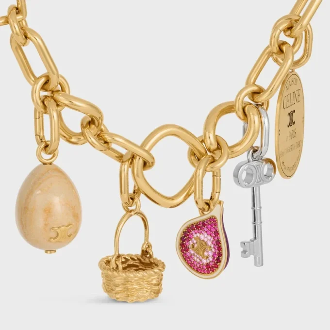 Charms Panier in messing met gouden afwerking