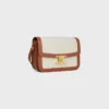 Classique Triomphe-tas van textiel met Triomphe-patroon en kalfsleer