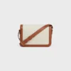 Classique Triomphe-tas van textiel met Triomphe-patroon en kalfsleer