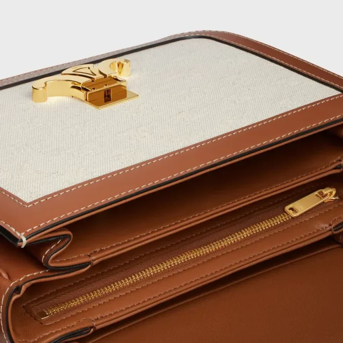 Classique Triomphe-tas van textiel met Triomphe-patroon en kalfsleer