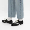 De platte sneaker in grosgrain, fluweel, suède geitenleer en lamsleer
