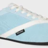 De platte sneaker in grosgrain, fluweel, suède geitenleer en lamsleer