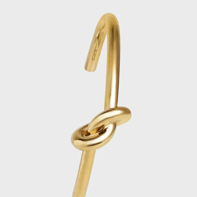 Extra dunne Knot-armband van messing met gouden afwerking