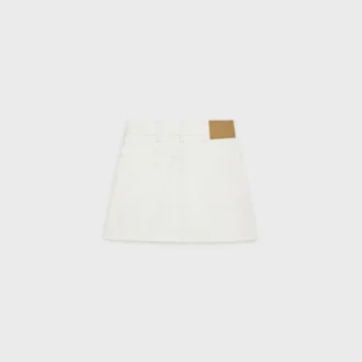 Geborduurde minirok van wit denim met raw wash