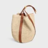 Grote Drop Bucket-tas van raffia en kalfsleer