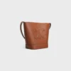 Kleine Cuir Triomphe-tas in glad kalfsleer