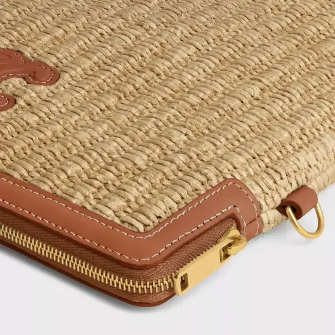 Kleine etui met riem van textiel met raffia-effect en kalfsleer