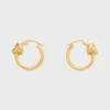 Kleine hoepels met knoop in messing met gouden afwerking