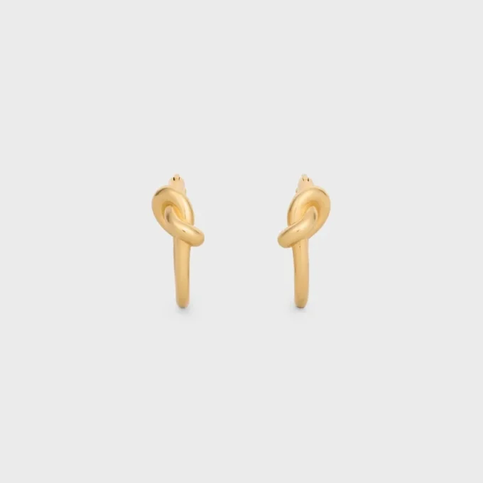 Kleine hoepels met knoop in messing met gouden afwerking