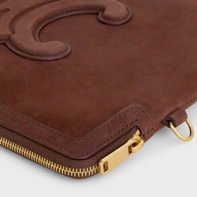 Kleine tas met riem Cuir Triomphe van generfd kalfsleer