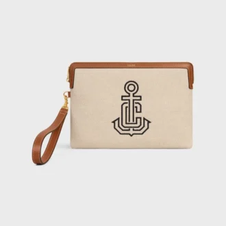 Kleine tas met riem van textiel met geborduurd anker en kalfsleer