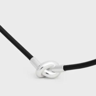 Knoopketting van kalfsleer en messing met rhodiumafwerking