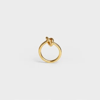 Knoopring van messing met gouden afwerking