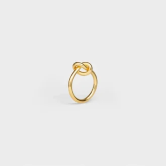 Knoopring van messing met gouden afwerking