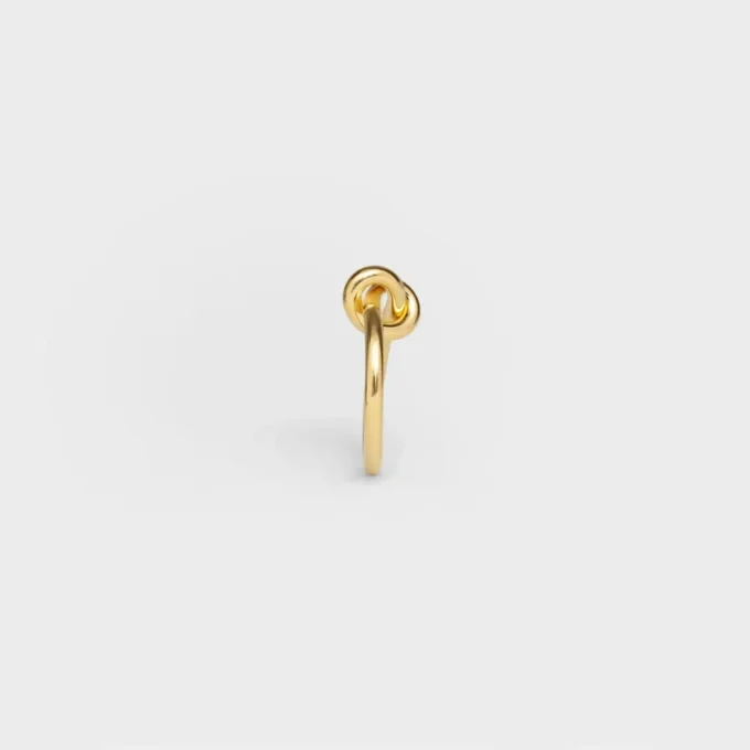 Knoopring van messing met gouden afwerking