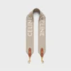 Korte riem van wol met CELINE-jacquard en gouden afwerking