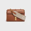 Korte riem van wol met CELINE-jacquard en gouden afwerking
