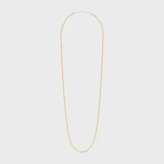 Lange ketting met bedels van messing met goud- en rhodiumafwerking