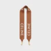 Lange riem van wol met CELINE-jacquard en gouden afwerking