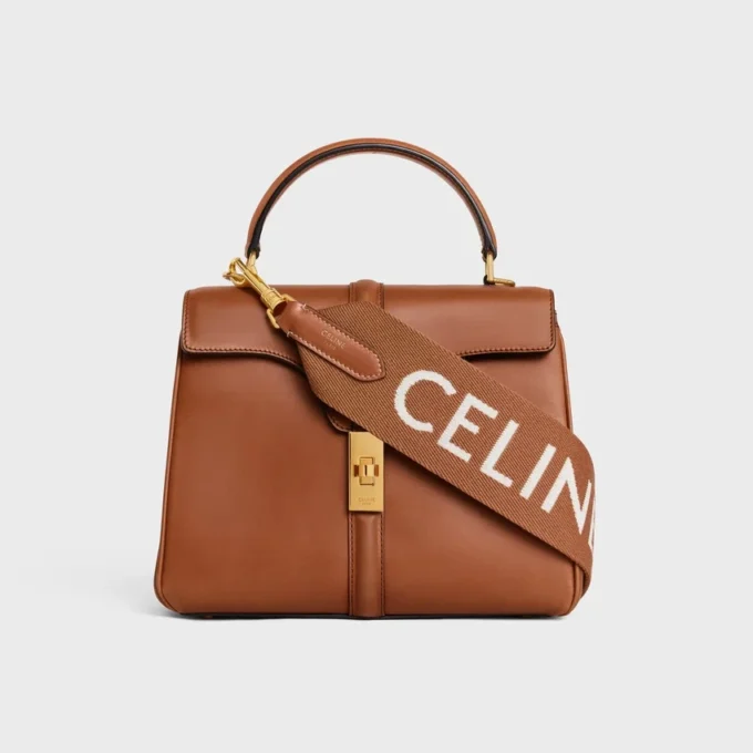 Lange riem van wol met CELINE-jacquard en gouden afwerking