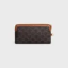 Lange tas met riem van Triomphe Canvas en kalfsleer