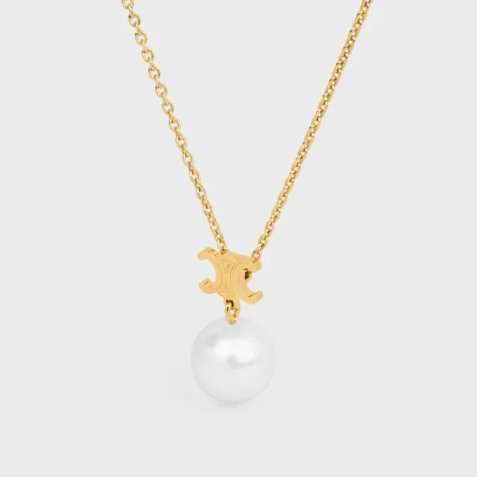Les Perles CELINE ketting van harsparels en messing met gouden afwerking