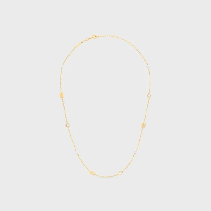 Les Perles CELINE ketting van strass, harsparels en messing met gouden afwerking