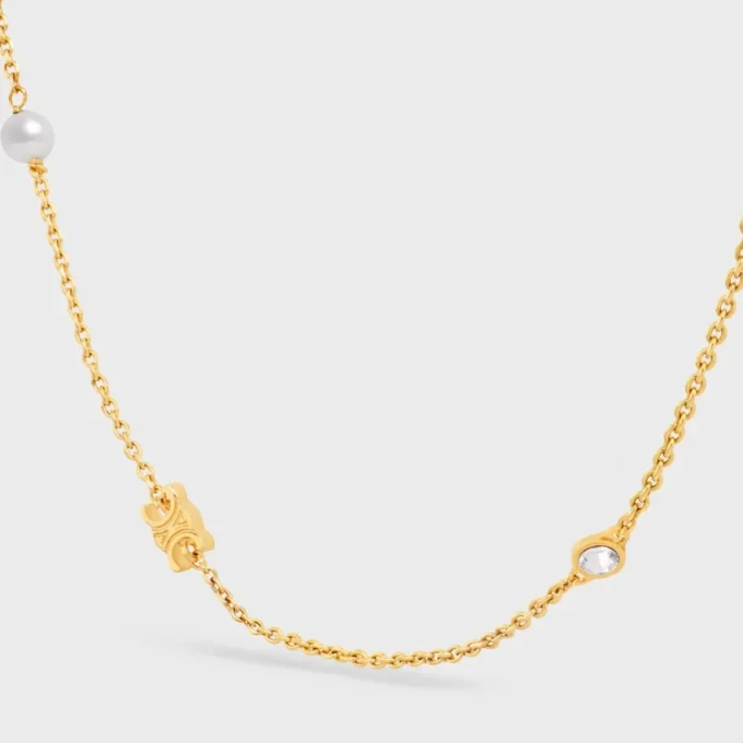 Les Perles CELINE ketting van strass, harsparels en messing met gouden afwerking