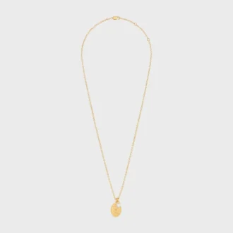 Les Perles CELINE medaillonketting van harsparel en messing met gouden afwerking