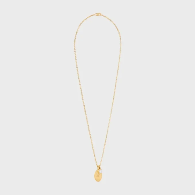 Les Perles CELINE medaillonketting van harsparel en messing met gouden afwerking