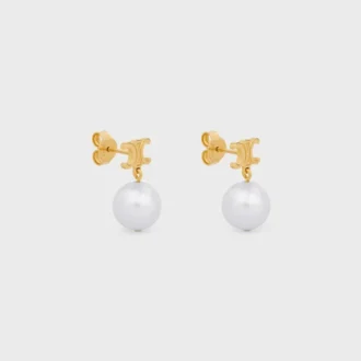 Les Perles CELINE Oorbellen van messing met gouden afwerking en parels van hars